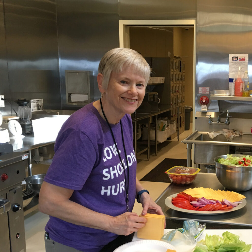 Mary Anne volunteering in the WC&S emergency shelter kitchen